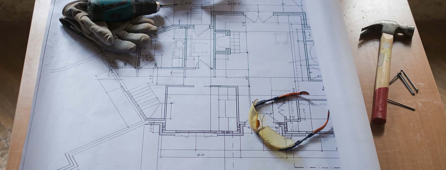 Commercial Business - blueprints on a desk